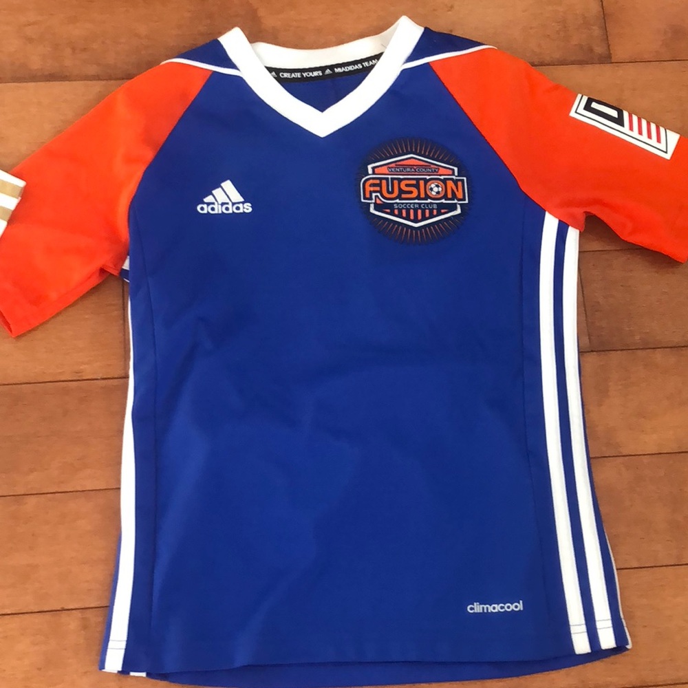 5 assorted kids soccer jerseys